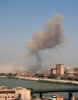 A plume of smoke is seen following a large explosion that rocked an Iraqi army complex at the Rusafa Military Command headquarters in eastern Baghdad. AFP