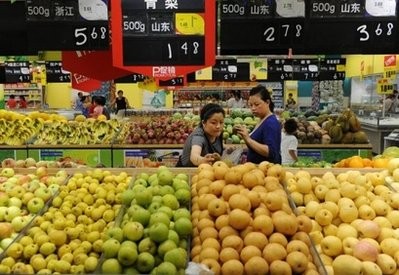 Chinese shoppers are pictured at a supermarket in Hefei, central China's Anhui province.