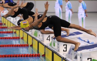 (R-L) Natsaya Susuk of Thailand, Natsumi Hoshni of Japan and Lu Ying of China compete in the women's 50m butterfly heats in the swimming event of the 16th Asian Games in Guangzhou on November 18, 2010. AFP