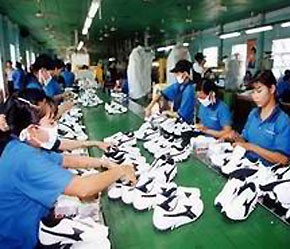Workers make footwear for export at Pou Yuen Vietnam Company, 100% capital owned by Taiwan, in Ho Chi Minh City’s Binh Tan District