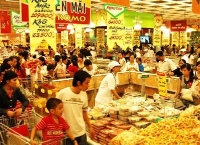 Shoppers at a supermarket in Ho Chi Minh City during Tet last year.