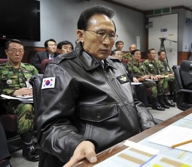 In this Nov. 23, 2010 file photo, South Korean President Lee Myung-bak has a briefing at the Joint Chiefs of Staff in Seoul as the military was put on top alert after North Korea's artillery attack on a South Korean island of Yeonpyeong.