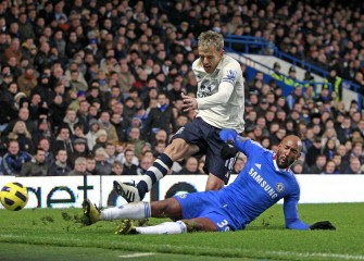 Chelsea's Nicolas Anelka (R) vies with Everton's English player Phil Neville at Stamford Bridge in London, England on December 4, 2010. AFP
