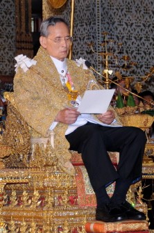 This handout photo from the Royal Bureau taken on December 5, 2010 shows Thai King Bhumibol Adulyadej reading a statement during his 83rd birthday at the Grand Palace in Bangkok. AFP