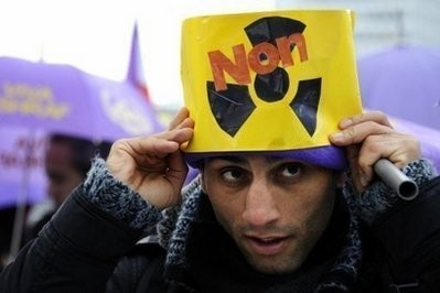 AFP - An Iranian opposition supporter protests at the Place des Nations square in Geneva.