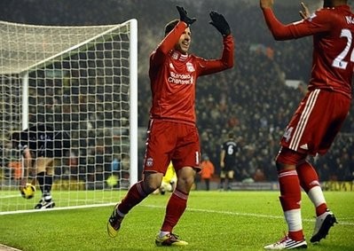 Liverpool's Argentinian midfielder Maxi Rodriguez celebrates scoring against Aston Villa. AFP