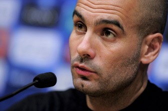 FC Barcelona's coach Josep Guardiola looks on as he gives a press conference at the Camp Nou stadium in Barcelona, on December 6, 2010, on the eve of the UEFA Champions League football match against Russian club FC Rubin Kazan. AFP