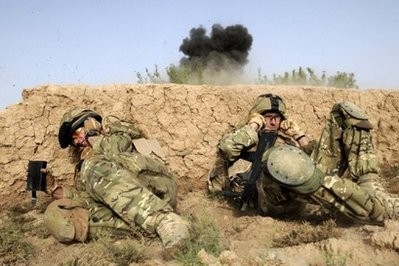 (AFP file) Ministry of Defence-issued photo shows British soldiers taking cover as they shelter from a controlled explosion in Sayedebad District, Helmand Province.