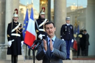 Syrian president Bashar al-Assad delivers a speech at the Elysee Palace in Paris on December 9.