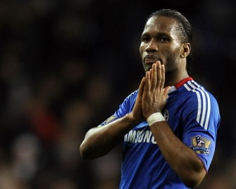Didier Drogba gestures to the fans at the end of the game shortly after having a penalty saved against Tottenham Hotspur. AFP