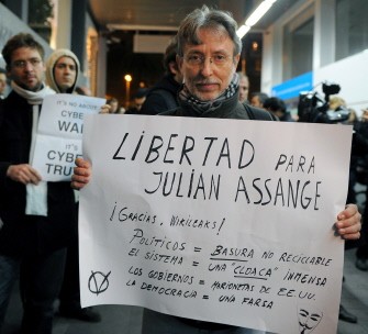 Supporters of WikiLeaks demonstrate to support WikiLeaks founder Julian Assange in Barcelona, Spain on December 11, 2010. AFP
