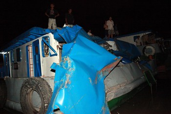 A barge’s stern is severely damage after the incident (Photo: SGGP)