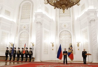Russian President Dmitry Medvedev delivers a speech as he presents the Federal Security Service flag in Moscow on December 17, 2010.