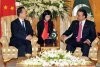 This handout picture taken on December 18, by the Press Information Department, shows Pakistan's President Asif Ali Zardari (right) talking with Chinese Premier Wen Jiabao upon his arrival at the presidency in Islamabad.