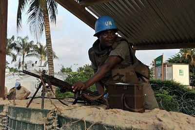AFP files - A Togolese UN peacekeeper mans a position at the entrance of the Golf hotel in Abidjan.