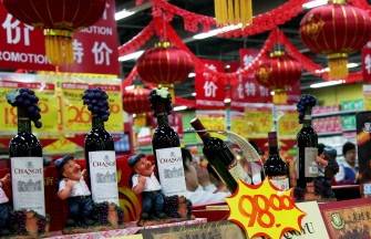 AFP - This photo taken on September 21, 2010 shows bottles of adulterated wine, produced in now shut-down wineries that were using famous brand names, on sale at a wine fair in Shijiazhuang, north China's Hebei province.