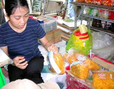 Chinese dry fruits packed in nylon bags selling in Binh Tay market (Photo: SGGP)