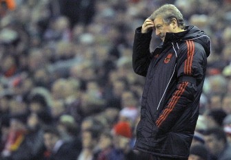 Roy Hodgson watches the Liverpool vs. Wolverhampton Wanderers match at Anfield on December 29, 2010. AFP