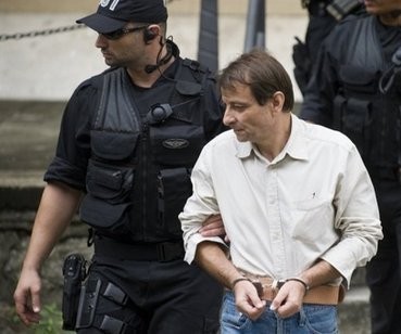 AFP file - Italian ex-militant Cesare Battisti leaves Rio de Janeiro's Federal Court in 2009, after testifying.
