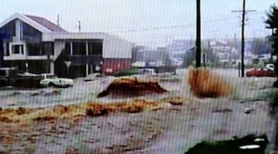 Screengrab taken on January 10, 2010 from footage aired by Australia's Channel 9 shows flood waters racing through the city of Toowoomba.