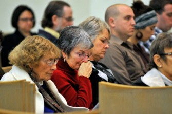 Parishioner Elizabeth Fimbres (2nd L) attends an interfaith service at the Catalina United Methodist Church on January 11, 2011 in Tucson, Arizona. AFP