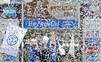 Qatar's driver Nasser Al-Attiyah (R) and German co-driver Timo Gottschalk hold their trophies on the podium after winning the 2011 Dakar Rally in Buenos Aires, Argentina, on January 16, 2011. AFP
