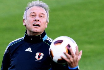 Japan coach Alberto Zaccheroni plays with the ball during a training session at the al-Ahli club in Doha on January 24, 2011. AFP