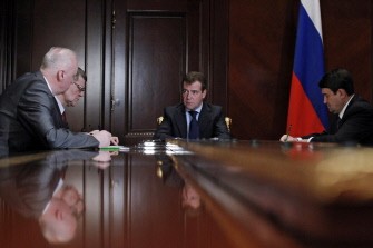 Russian President Dmitry Medvedev (C) chairs an emergency meeting on January 24, 2011 at Gorki residence with the Head of the Investigative Committee at the Russian Prosecutor's Office Alexander Bastrykin (L), Russia's Prosecutor General Yuri Chaika (2ndL) and Transport Minister Igor Levitinon, following a suicide attack at Domodedovo international airport. AFP