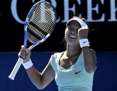 Li Na gestures as she celebrates beating Caroline Wozniacki in the women's semi-final at the Australian Open in Melbourne. AFP