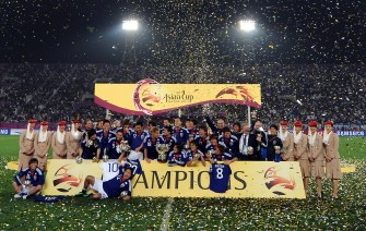 Japanese players celebrate after winning the 2011 Asian Cup on January 29, 2011. Japan beat Australia 1-0 to win fourth Asian Cup title. AFP