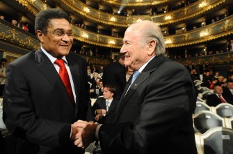 Legendary Portuguese forward Eusebio (l) shakes hand with FIFA president Sepp Blatter during the Czech Republic's Football Player of the Year 2010 award ceremony on February 7, 2011 in Prague. AFP