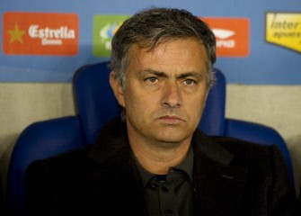 Real Madrid's Portuguese coach Jose Mourinho sits on the side lines before a Spanish league football match Espanyol vs Real Madrid on February 13, 2011 at the Cornella-El Prat stadium in Cornella de Llobregat. AFP