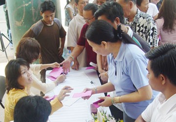 (File) Voters poll for National Assembly deputies for the 12th term