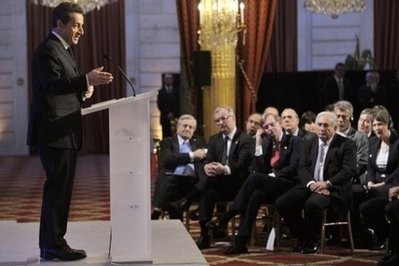 French President Nicolas Sarkozy (L) delivers a speech to G20 Central bank governors at the Elysee Palace