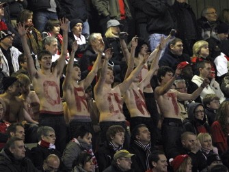 Leyton Orient fans gesture during the match against Arsenal during their FA Cup match at The Matchroom Stadium, Brisbane Road in London on February 20, 2011. AFP