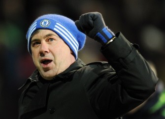 Chelsea's Manager Carlo Ancelotti gestures to the fans after the final whistle against FC Copenhagen on February 22, 2011. Chelsea's Nicolas Anelka scored twice and Chelsea won the game 2-0. AFP