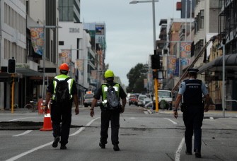 Police patrol the "deserted city" streets of the exclusion zone on February 23, 2011 in Christchurch. AFP