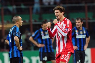 Mario Gomez (R) celebrates after scoring. AFP