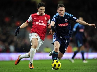 Arsenal's French midfielder Samir Nasri (L) vies with Stoke City's English midfielder Dean Whitehead (R) during their English Premier League at the Emirates Stadium in London on February 23, 2011. AFP