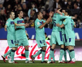 Barcelona's players celebrate after scoring against Mallorca. AFP