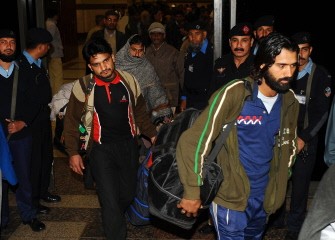Pakistanis arrive at Allama Iqbal International Airport in Lahore, Pakistan on March 1, 2011 after fleeing from Libya. AFP