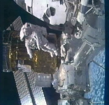 This image taken from video by NASA television shows astronaut Stephen Bowen during a spacewalk, Monday, Feb. 28, 2011