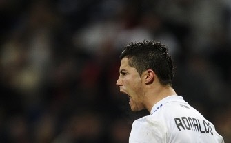 Cristiano Ronaldo celebrates after scoring against Malaga at the Santiago Bernabeu Stadium on March 3, 2011 in Madrid. AFP