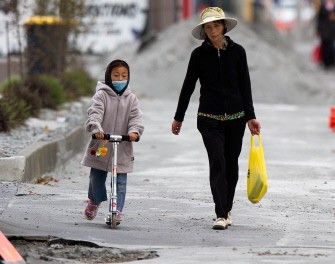 Residents make their way through downtown Christchurch on March 5, 2011. AFP