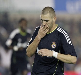 Karim Benzema celebrates his second goal. AFP