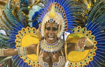A reveller of Rio de Janeiro's Portela samba school performs at the Sambadrome in Rio de Janeiro on March 6, 2011. AFP