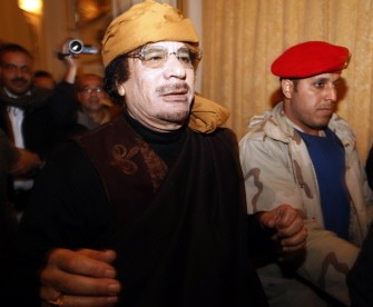 Moamer Kadhafi arrives at the Rixos hotel in the capital Tripoli on March 8, 2011. AFP