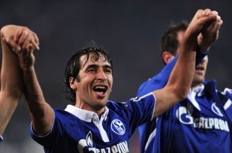 Schalke's Raul celebrates with his teammates after the match Schalke 04 vs FC Valencia. AFP