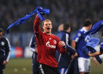 Schalke's goalkeeper Manuel Neuer celebrates after the match Schalke 04 vs FC Valencia. AFP