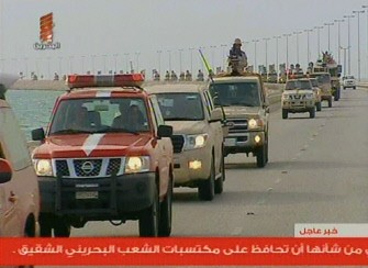 An image grab taken from Bahrain TV shows vanguard of a contingent of Gulf troops arriving in the unrest-wracked Kingdom of Bahrain across a causeway from Saudi Arabia on March 14, 2011. AFP